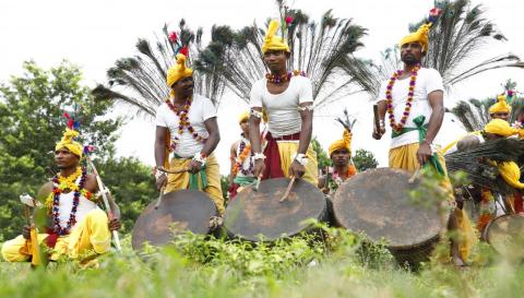 Tribals getting ready for dance during karma celebration in Ranchi, Jharkhand